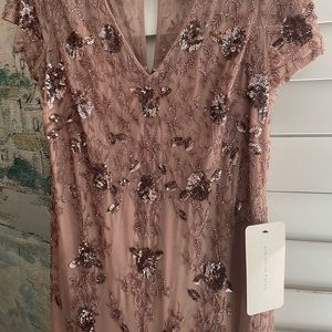 Adrianna Papell Gown. New with tags (never worn). Rose gold long gown.